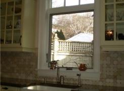 New kitchen window with arched transom
